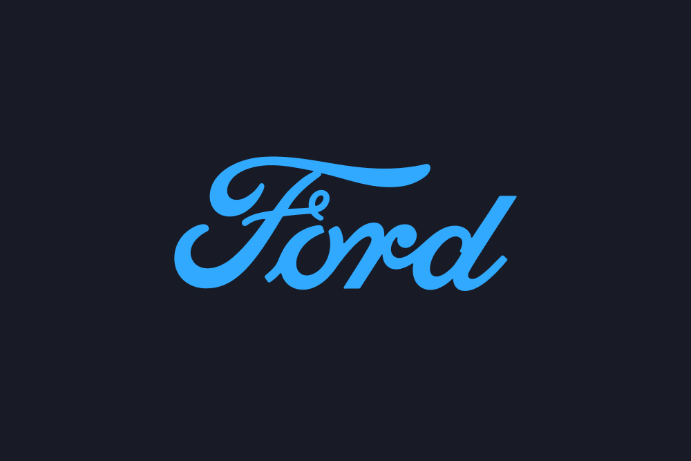 Logo Ford bleu sur fond sombre.
