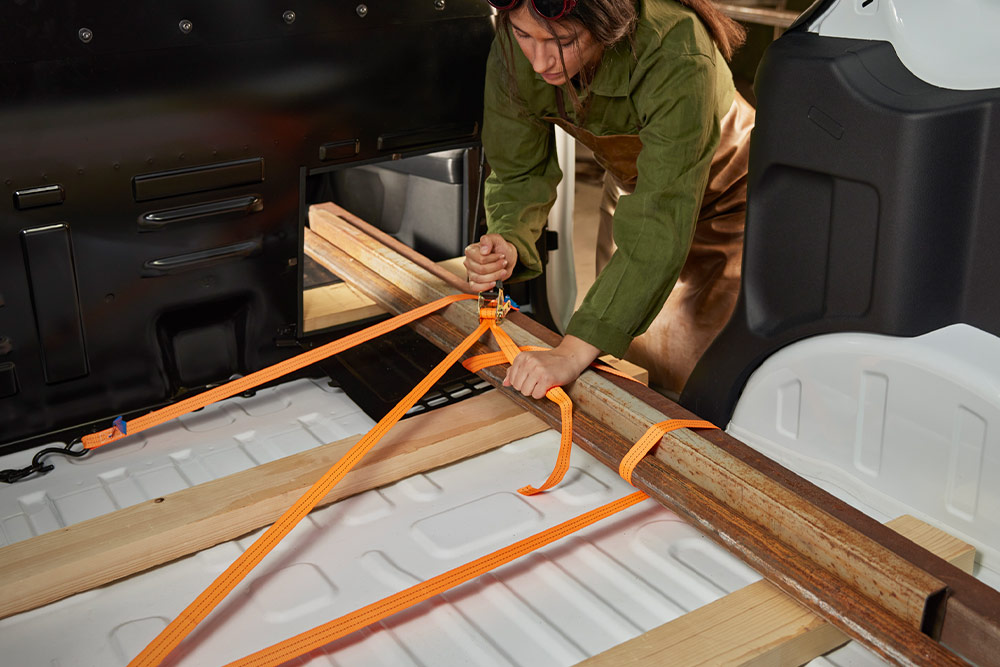 Utilisation de la cloison de séparation de l'espace de chargement du Ford Transit Courier
