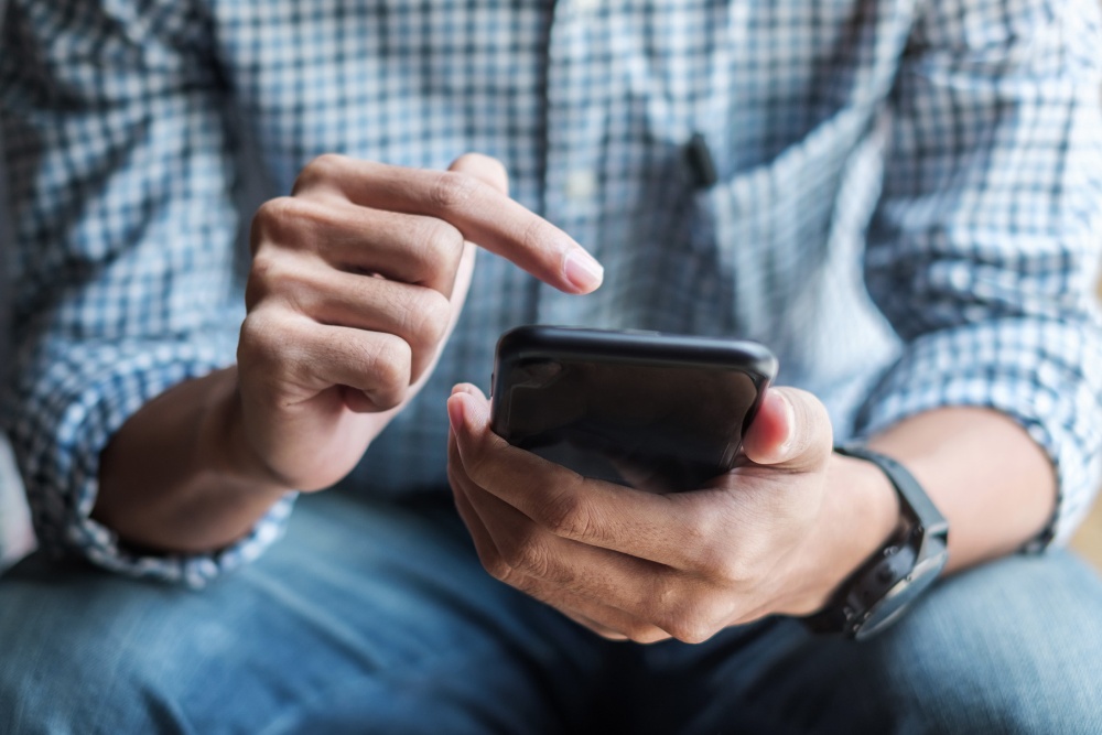 Client Ford utilisant un appareil mobile